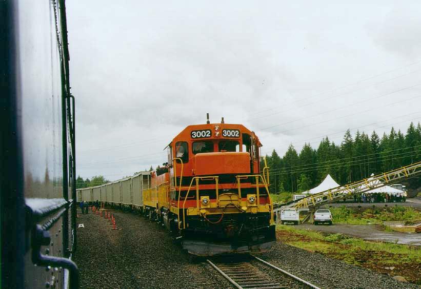 P&W 3002 pulling rock train viewed from 700 consist