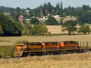 A Portland & Western train rolls through the rich Tualatin Valley farmland west of Portland
